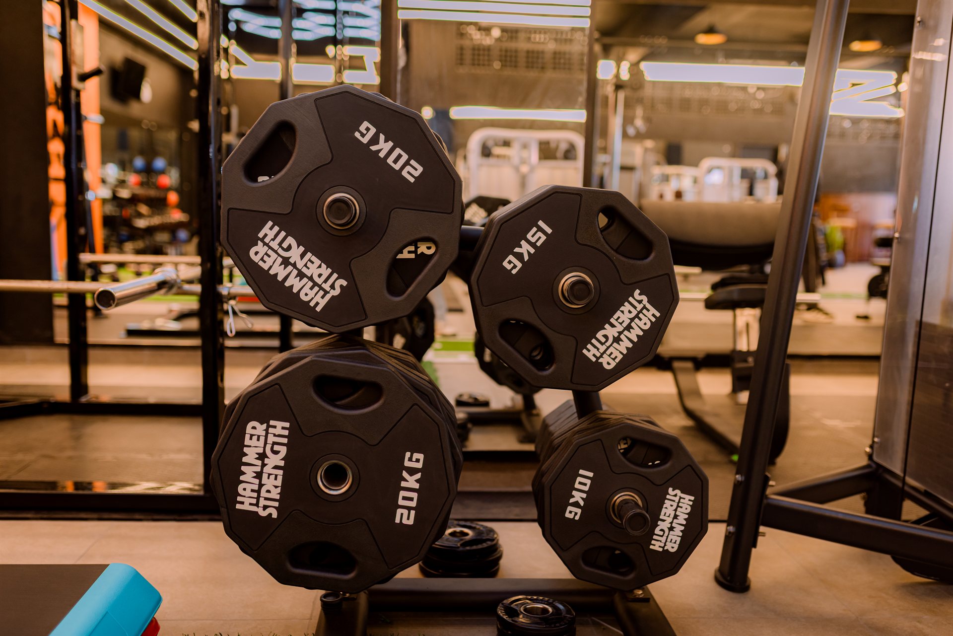 MAX HILL gym interior with free weights